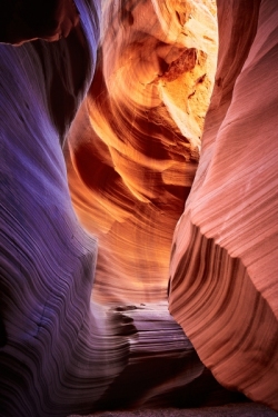 This image is an amazing example of the slot canyons around Page Arizona.  The purple, red, and yellow colors are so exciting.  This is Secret Canyon.  This canyon was so awesome to photograph!