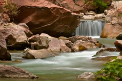 This nature image of a small waterfall was taken walking up the path from the Temple of Sinawava, in Zion National Park. There were people all around and yet this image still conveys the peaceful mood I felt being there. This is limited to 99 prints. If interested in a custom frame and mat with the print please contact me.